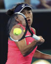 China's Zhang Shuai makes a forehand return to United States' Sloane Stephens during their first round singles match at the Australian Open tennis championship in Melbourne, Australia, Monday, Jan. 20, 2020. (AP Photo/Dita Alangkara)