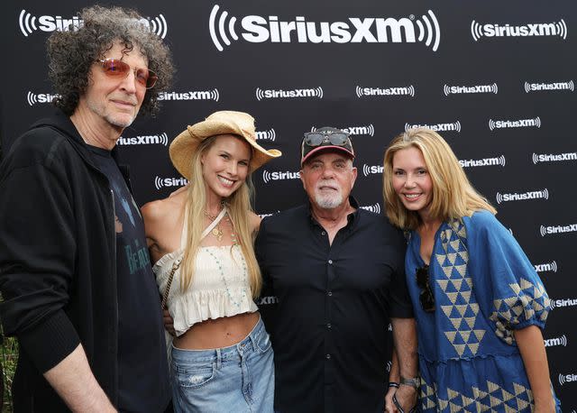 <p>Kevin Mazur/Getty</p> Howard and Beth Stern with Billy and Alexis Joel in the Hamptons on Aug. 14, 2023