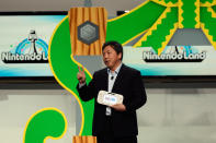 LOS ANGELES, CA - JUNE 05: Game designer and manager at Nintendo EAD Katsuya Eguchi introduces "NintendoLand," a theme park game with different activities during a press conference for Nintendo's new hand held game console Wii U at the Electronic Entertainment Expo at the Galen Center on June 5, 2012 in Los Angeles, California. Thousands are expected to attend the annual three-day convention to see the latest games and announcements from the gaming industry. (Photo by Kevork Djansezian/Getty Images)
