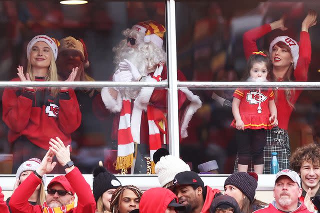 <p>Jamie Squire/Getty</p> Taylor Swift is seen in a suite prior to a game between the Las Vegas Raiders and the Kansas City Chiefs at GEHA Field at Arrowhead Stadium on December 25, 2023 in Kansas City, Missouri.