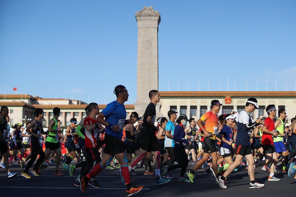File. Participants compete during the 2017 Beijing Marathon at Tiananmen Square on 17 September 2017 in Beijing, China  (Getty Images)