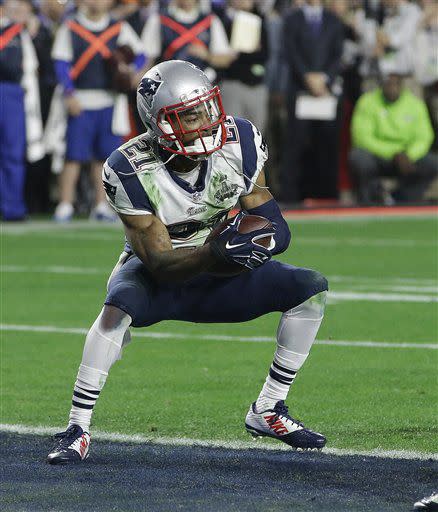 New England Patriots strong safety Malcolm Butler (21) intercepts a pass intended for Seattle Seahawks wide receiver Ricardo Lockette during the second half of NFL Super Bowl XLIX football game Sunday, Feb. 1, 2015, in Glendale, Ariz. (AP Photo/Kathy Willens)