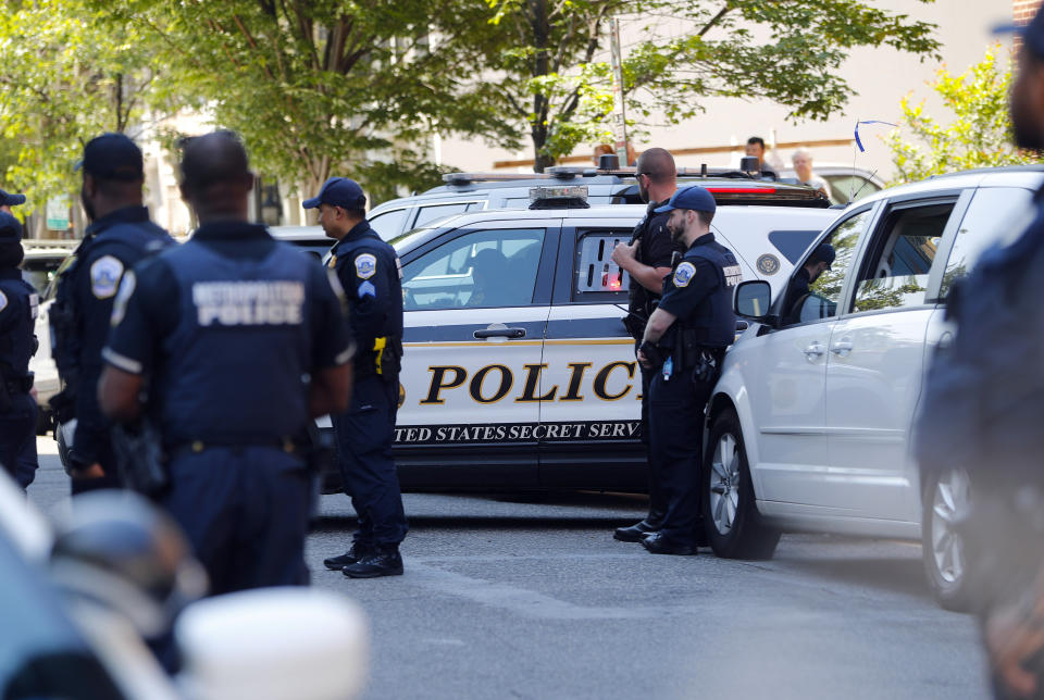 A U.S. Secret Service police car, with pro Nicolas Maduro supporters inside, departs after they were taken into custody during the eviction of Maduro's supporters from the Venezuelan Embassy in Washington, Thursday, May 16, 2019. (AP Photo/Pablo Martinez Monsivais)