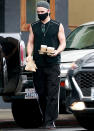 <p>Colin Farrell wears a tank top and track pants while out for a coffee run in L.A. on Wednesday.</p>