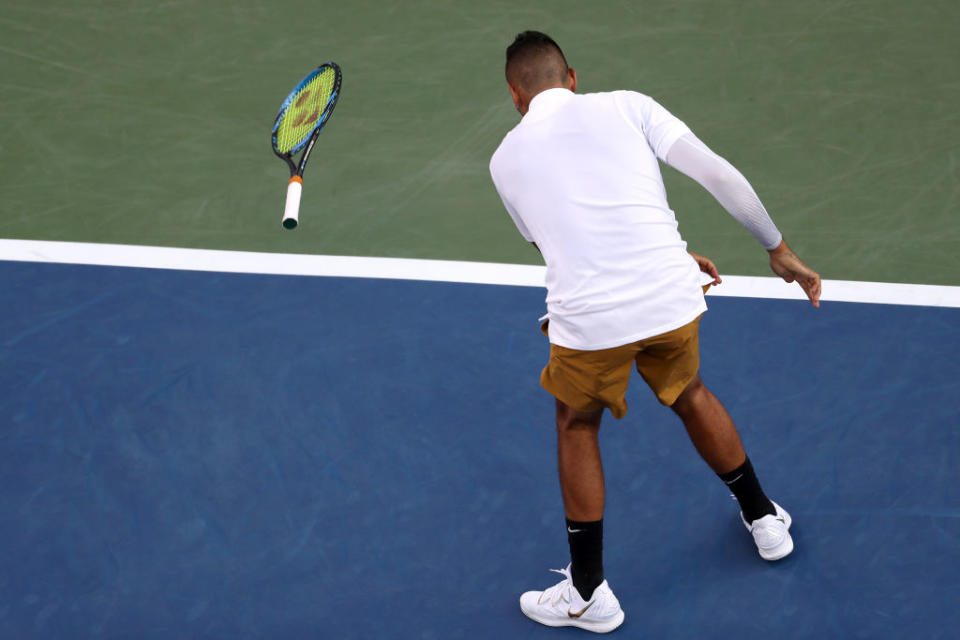 Nick Kyrgios of Australia throws his racket against Lorenzo Sonego of Italy during Day 3 of the Western and Southern Open at Lindner Family Tennis Center on August 12, 2019 in Mason, Ohio. (Photo by Rob Carr/Getty Images)