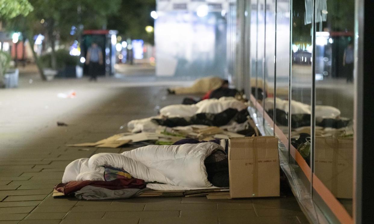 <span>Homeless people sleep rough on the streets due to the rising cost of living and rent prices in London.</span><span>Photograph: Anadolu Agency/Getty Images</span>