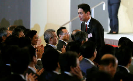 Japan's former Foreign Minister Seiji Maehara stands up after he was elected as the leader of Japan's main opposition party, the Democratic Party, during the party plenary meeting in Tokyo, Japan September 1, 2017. REUTERS/Toru Hanai