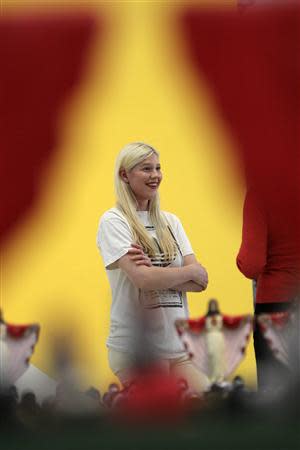 Artist Petra Cortright is seen near "Maracana" by Nelson Leirner, based on Maracana Stadium in Brazil, during construction of the exhibition, "Futbol: The Beautiful Game", at the Los Angeles County Museum of Art (LACMA) in Los Angeles, California, January 27, 2014. REUTERS/David McNew