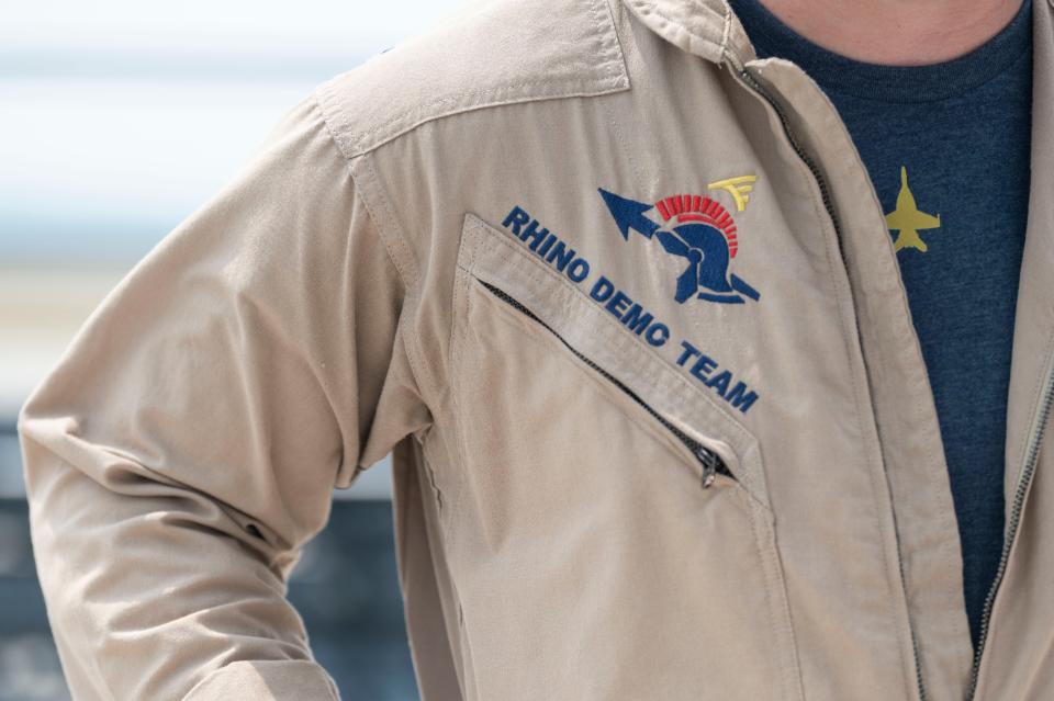 Lt. Jake Brouker of the U.S. Navy Rhino Demo Team speaks ahead of the Field of Flight air show at Western Michigan University College of Aviation in Battle Creek on Thursday, June 29, 2023.