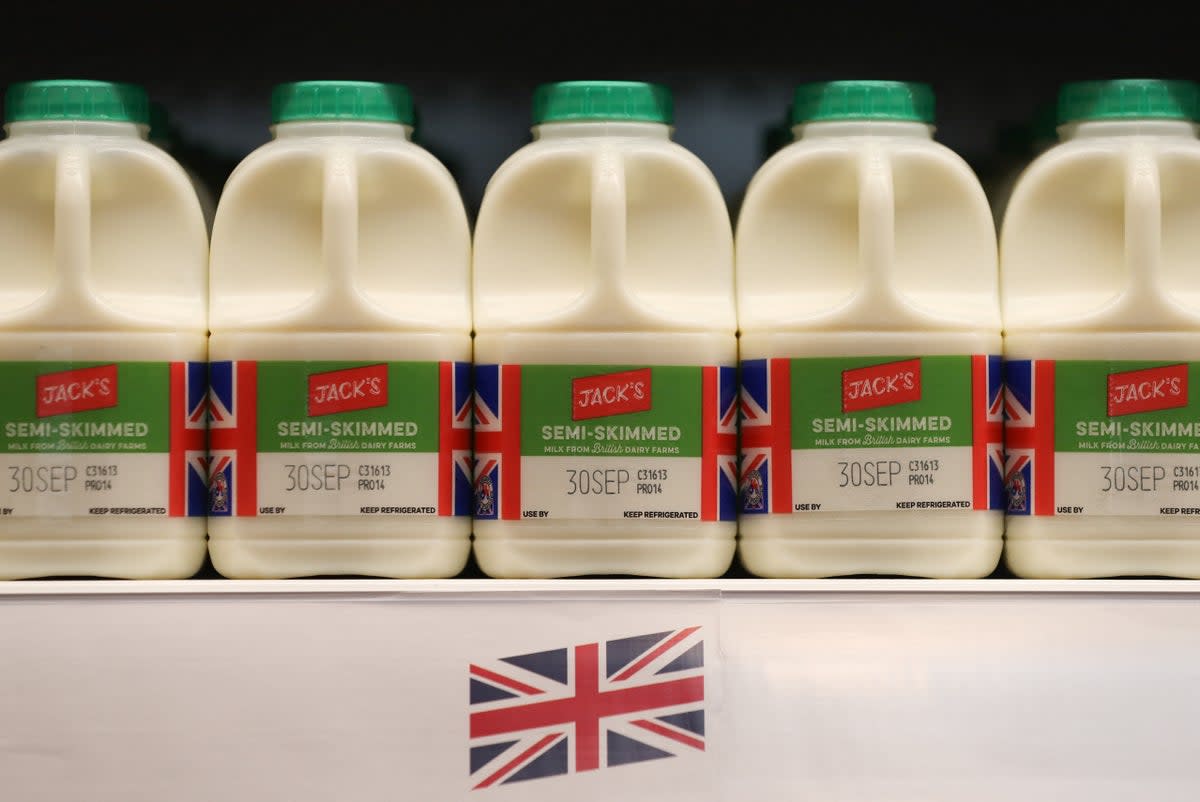 Milk bottles with coloured caps are being phased out by a number of supermarkets (AFP via Getty Images)