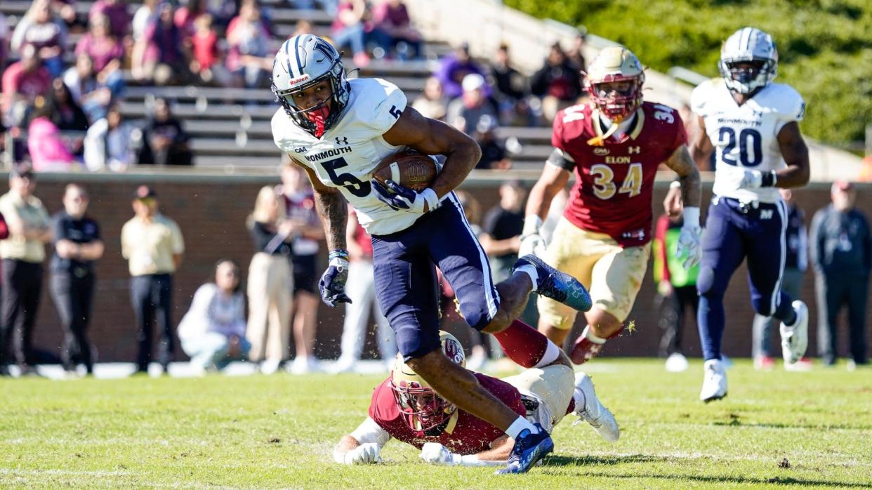 Monmouth receiver Dymere Miller picks up yardage during a 28-26 loss to Elon on Oct. 21, 2023 in Elon, North Carolina.
(Credit: Monmouth Athletics)