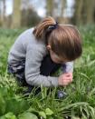 <p>Princess Charlotte smells a bluebell at her home in Norfolk in this sweet photo taken by her mom, the Duchess of Cambridge.</p>