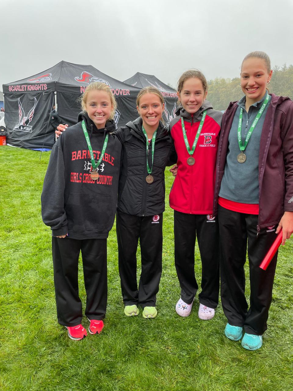 Left to right: Lilly DeDecko, Callie DeDecko, Chloe Dibb, and Ava Bullock won the 4x1600m race championship in a national qualifying time of 21:46 at the Division 2 State Relays.