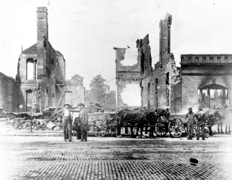 The Akron City Building and Columbia Hall were left in ruins after the riot of 1900, which was caused by a mob searching for a man accused of assaulting a child.