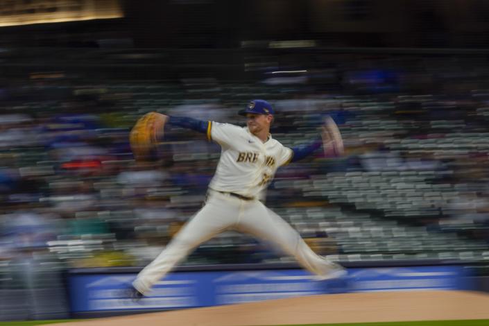 Milwaukee Brewers starter Eric Lauer throws during the first inning of a baseball game against the Los Angeles Dodgers Thursday, April 29, 2021, in Milwaukee. (AP Photo/Morry Gash)