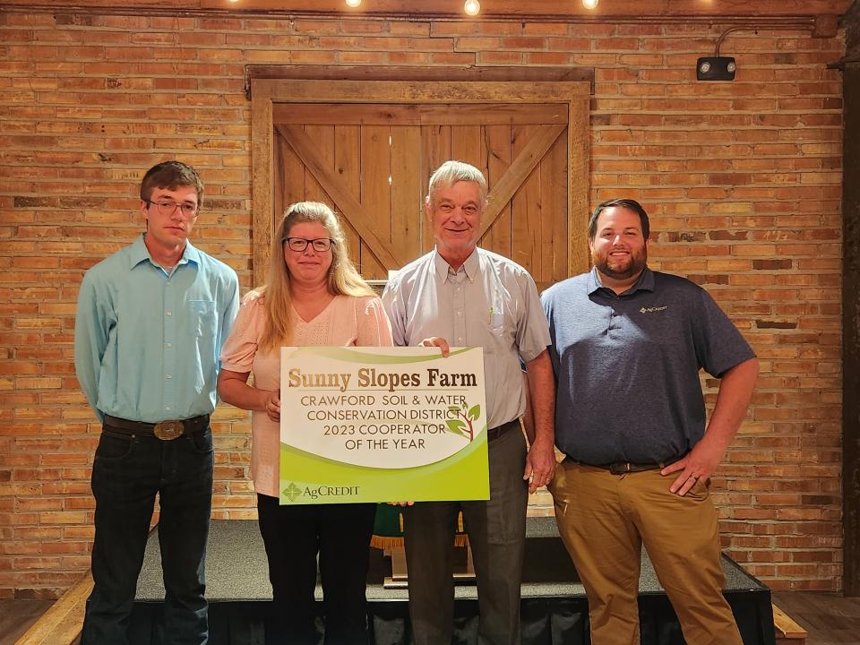 Crawford Soil and Water Conservation District presented its outstanding cooperator award to Sunny Slopes Farm during the annual Crawford SWCD meeting on Aug. 30.