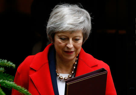 Theresa May leaves Downing Street today ahead of the vote. (REUTERS/Henry Nicholls)