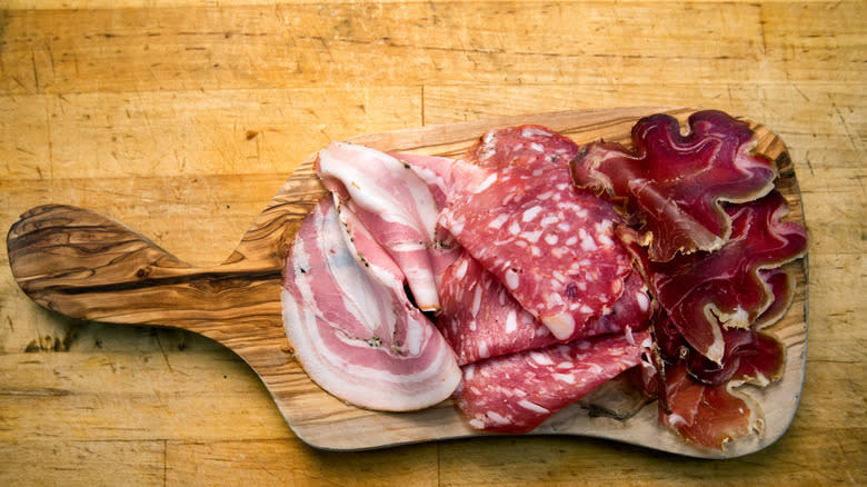 Charcuterie meats on wooden board