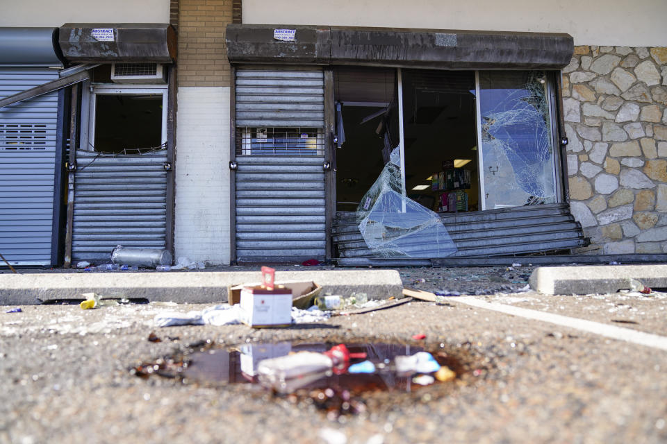 Shown is the aftermath of ransacked liquor store in Philadelphia, Wednesday, Sept. 27, 2023. Police say groups of teenagers swarmed into stores across Philadelphia in an apparently coordinated effort, stuffed bags with merchandise and fled. (AP Photo/Matt Rourke)