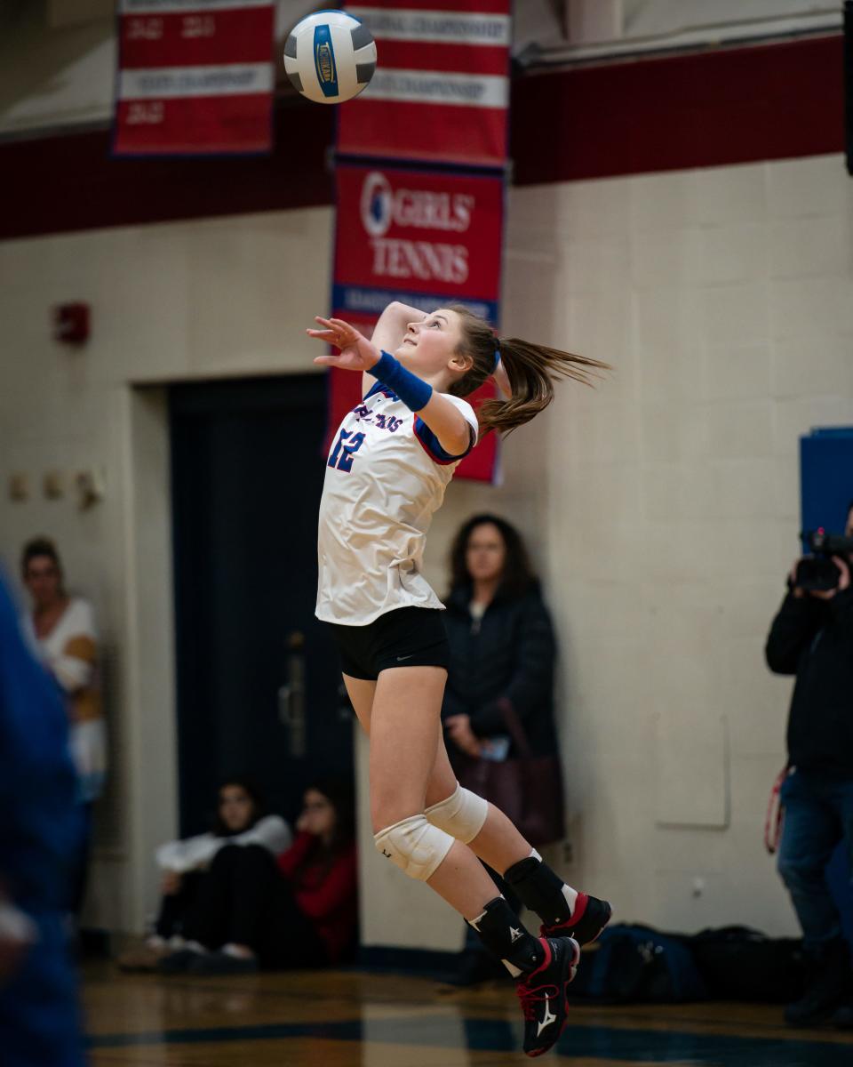 New Hartford's Makenzie Desmarais leaps high and serves the ball during a Jan. 12 match against Whitesboro. New Hartford's Spartans are Section III'e defending Class A winter champions and seeds No. 1 again this year.