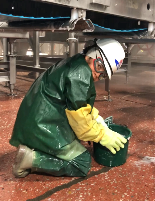 A worker at JBS Foods Plant in Grand Island, Neb. (Labor Department)