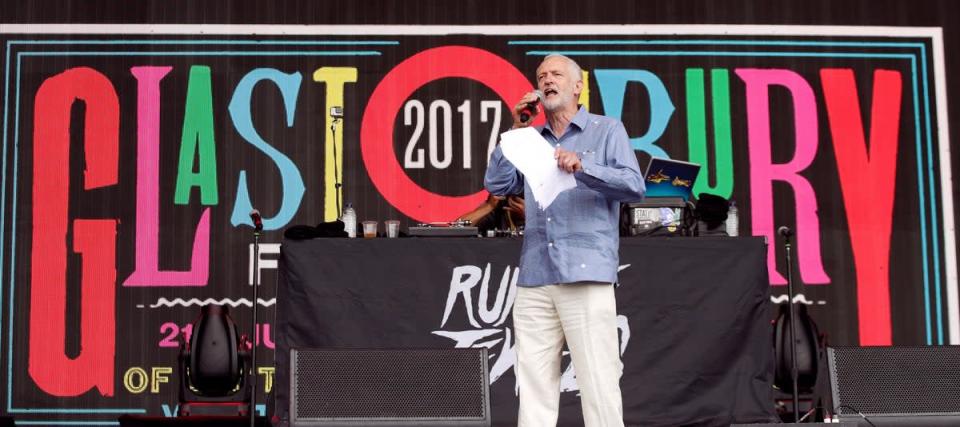 Labour leader Jeremy Corbyn speaks to the crowd from the Pyramid Stage at Glastonbury Festival in 2017 (Yui Mok/PA) (PA Archive)