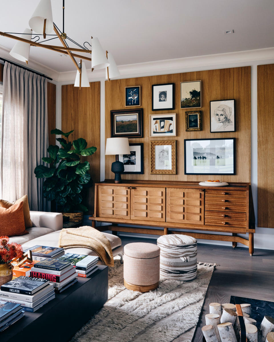 a living room with a modern  gallery wall