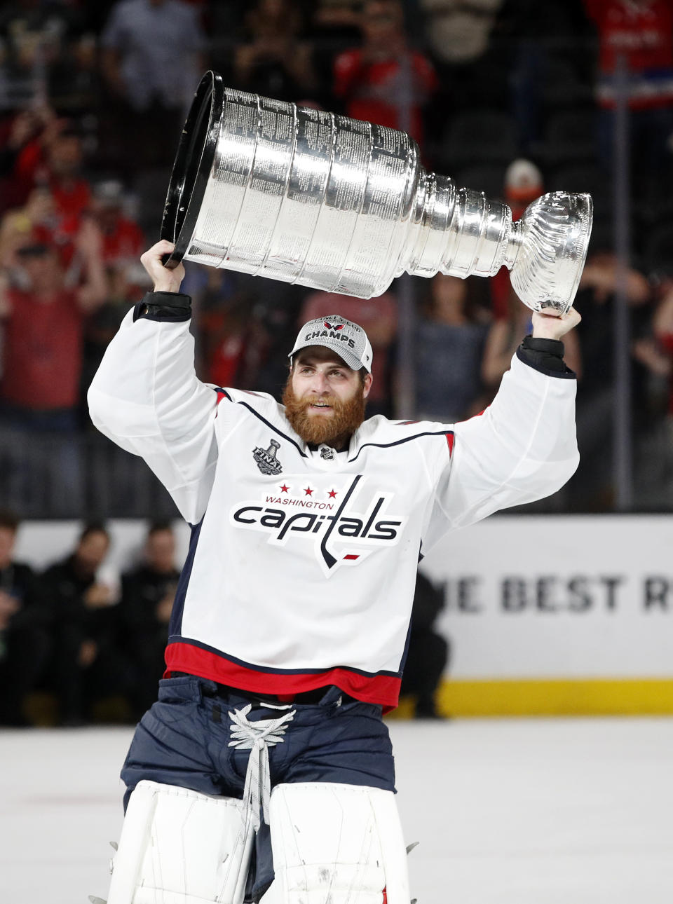 FILE - Washington Capitals goaltender Braden Holtby hoists the Stanley Cup after the Capitals defeated the Golden Knights 4-3 in Game 5 of the NHL hockey Stanley Cup Finals in Las Vegas, in this Thursday, June 7, 2018, file photo. Several goaltenders were on the move in NHL free agency Wednesday, July 28, 2021. Braden Holtby signed with the Dallas Stars (AP Photo/John Locher)