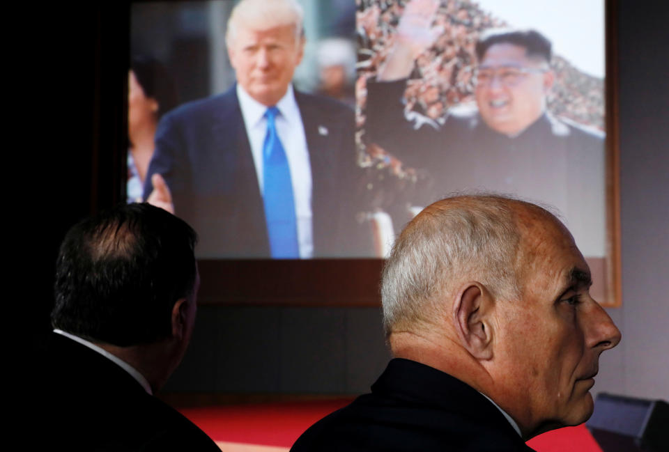 <p>Secretary of State Mike Pompeo and White House Chief of Staff John Kelly listen as President Donald Trump speaks during a news conference after his meeting with North Korean leader Kim Jong Un at the Capella Hotel on Sentosa island in Singapore, June 12, 2018. (Photo: Jonathan Ernst/Reuters) </p>