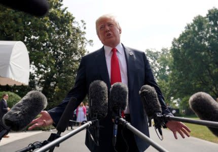 U.S. President Donald Trump speaks to reporters upon his departure from the White House in Washington, U.S., August 17, 2018.  REUTERS/Kevin Lamarque