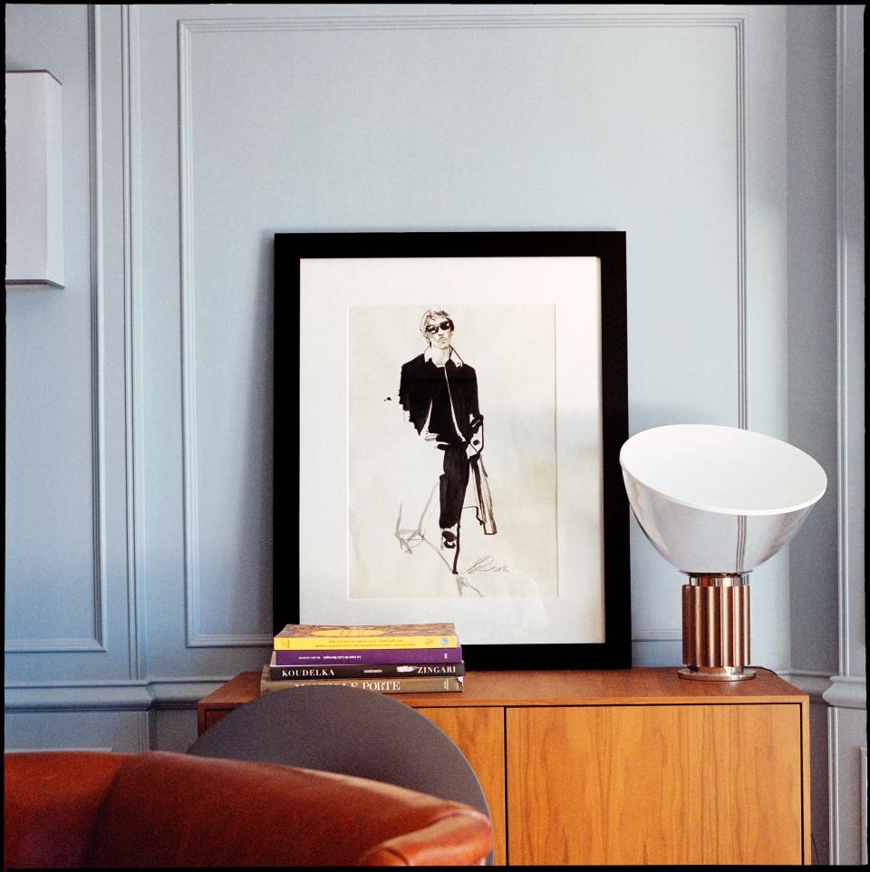 A Flos Taccia table lamp sits alongside an ink portrait of Piccioli by Richard Haines, both posed atop Paolo Capello’s Caruso audio cabinet (2015)—a fully connected design perfect for Piccioli's many aperitivi with extended family and friends. His favorite cocktail? An Aperol spritz. (Photography originally featured inside A Magazine Curated by Pierpaolo Piccioli, 2019.)