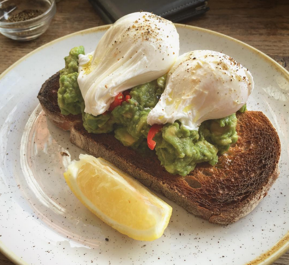 Smashed Avocado On Toast With A Poached Egg On Top