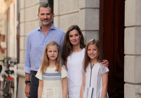 FILE PHOTO: Spain's King Felipe, Queen Letizia, Princess Leonor and Princess Sofia visit the village of Soller in the island of Mallorca, Spain, August 6, 2017. REUTERS/Enrique Calvo/File Photo