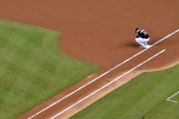 <p>Miami Marlins first baseman Justin Bour squats at first base prior to the game against the New York Mets at Marlins Park. Mandatory Credit: Jasen Vinlove-USA TODAY Sports </p>