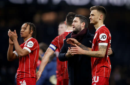 Soccer Football - Carabao Cup Semi Final First Leg - Manchester City vs Bristol City - Etihad Stadium, Manchester, Britain - January 9, 2018 Bristol City manager Lee Johnson after the match with Jamie Paterson Action Images via Reuters/Carl Recine