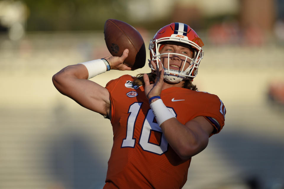 Clemson quarterback Trevor Lawrence warms up for the team's NCAA college football game against Charlotte on Saturday, Sept. 21, 2019, in Clemson, S.C. (AP Photo/Richard Shiro)
