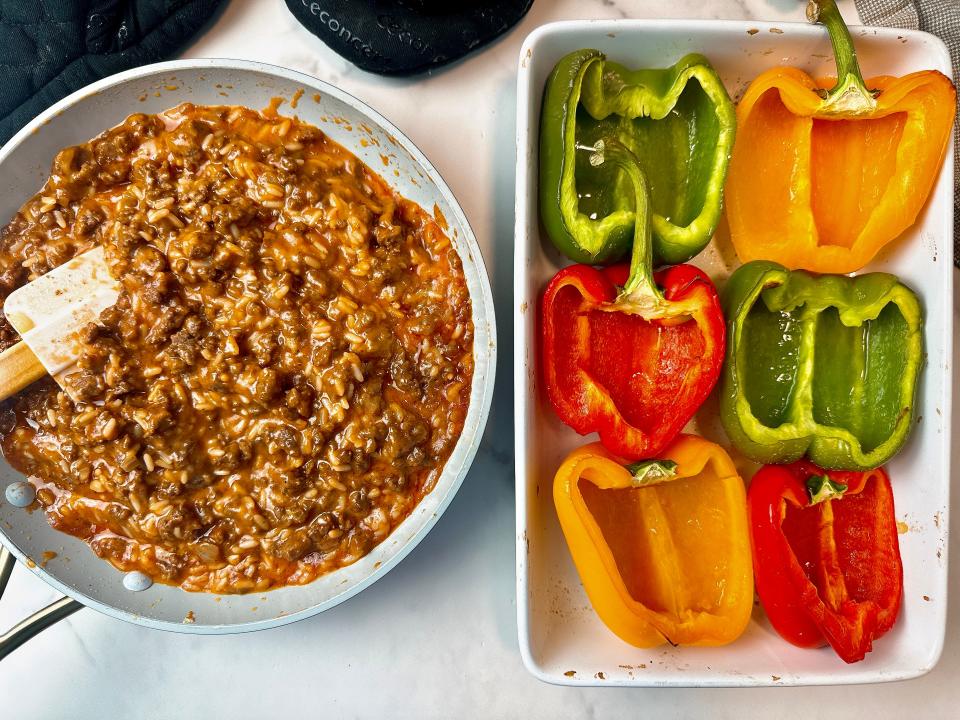 Cutting peppers in half makes stuffed peppers easier to make and eat.
