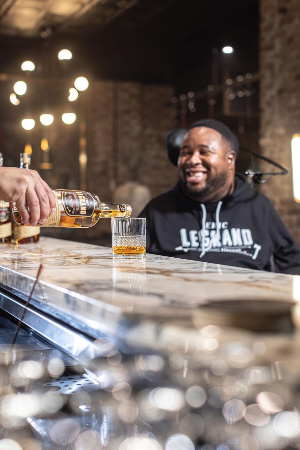 Former Rutgers University Scarlet Knight Eric LeGrand celebrates the one year anniversary of Eric LeGrand Kentucky Straight Bourbon Whiskey more than a decade after a paralyzing football injury.