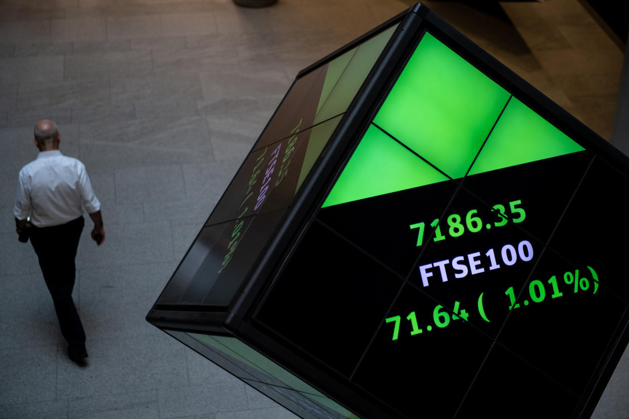 LONDON, ENGLAND - AUGUST 29: Financial market figures are shown on big screens and a ticker in the main entrance at London Stock Exchange on August 29, 2019 in London, England. The pound has come under renewed pressure after the government moved to prorogue parliament for five weeks, fueling fears of a no-deal Brexit. (Photo by Chris J Ratcliffe/Getty Images)