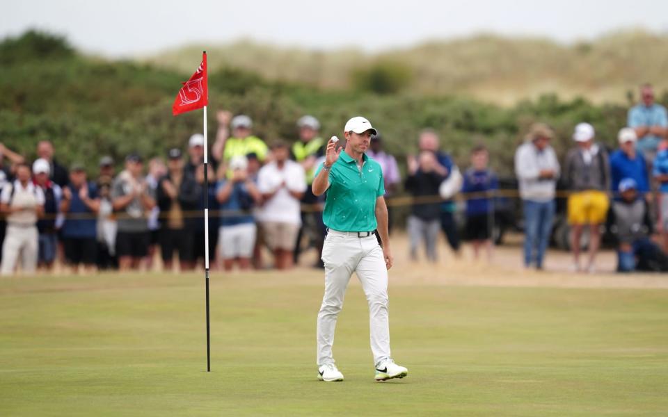 Rory McIlroy salutes the crowds after his eagle - PA