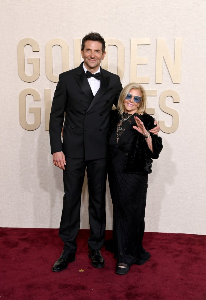 (L-R) Bradley Cooper and Gloria Campano attend the 2024 Golden Globes. WireImage,