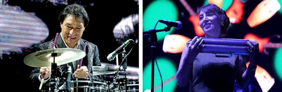 Jose Hilario Mejia Avante, left, plays the drums. Guadalupe Mejia Avante, right, plays a guache.