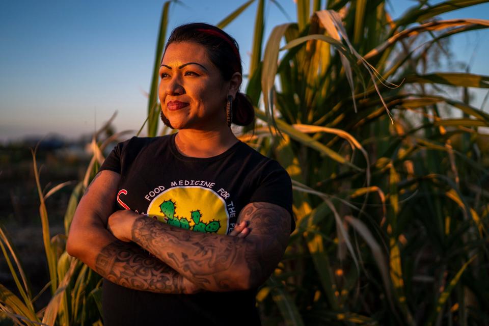Chef Maria Parra Cano poses for a portrait at Food Forest Cooperative on March. 17, 2022, in Phoenix. The farm co-op is a 1.5-acre plot of land located on Spaces of Opportunity in south Phoenix.