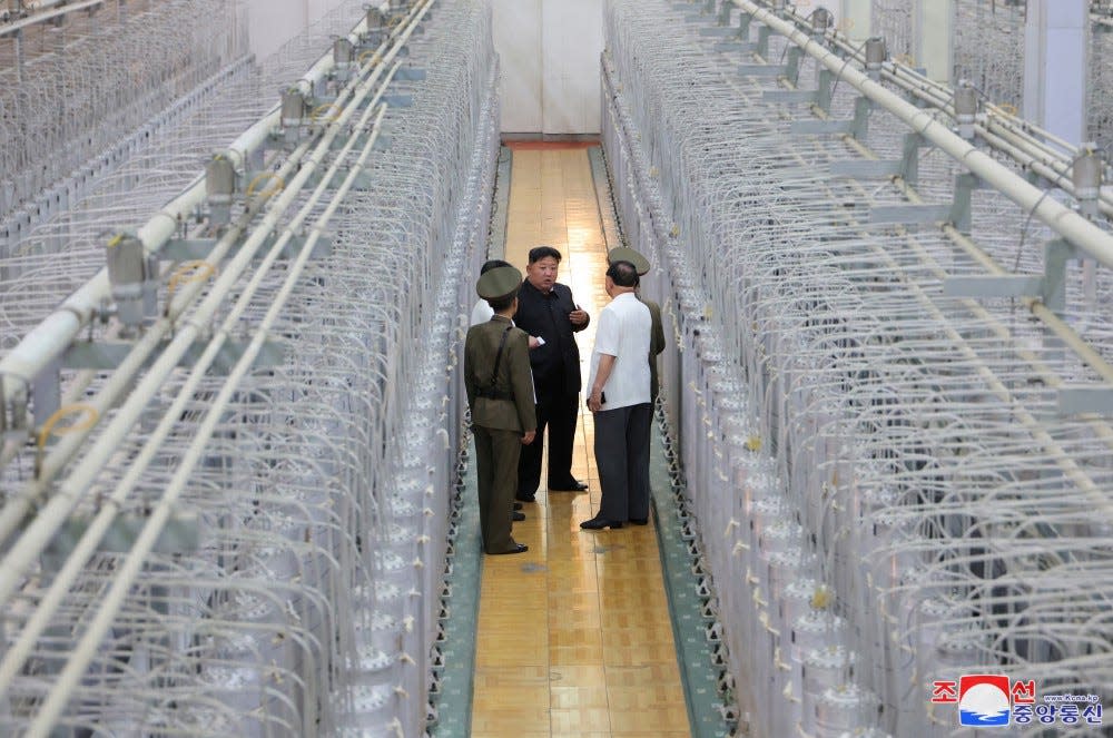 Kim Jong Un inspects a uranium-enrichment facility at an undisclosed location in North Korea.