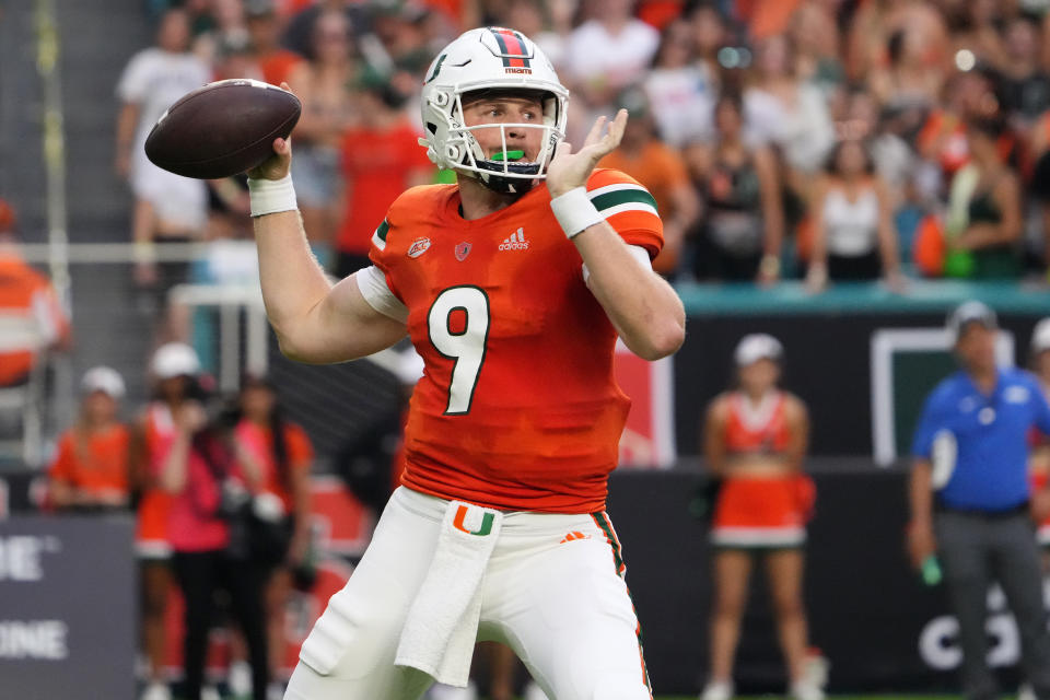 Sep 24, 2022; Miami Gardens, Florida, USA; Miami Hurricanes quarterback Tyler Van Dyke (9) attempts a pass against the Middle Tennessee Blue Raiders during the first half at Hard Rock Stadium. Mandatory Credit: Jasen Vinlove-USA TODAY Sports