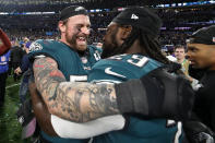 <p>Chris Long #56 and LeGarrette Blount #29 of the Philadelphia Eagles celebrate their teams 41-33 victory over the New England Patriots in Super Bowl LII at U.S. Bank Stadium on February 4, 2018 in Minneapolis, Minnesota. The Philadelphia Eagles defeated the New England Patriots 41-33. (Photo by Rob Carr/Getty Images) </p>