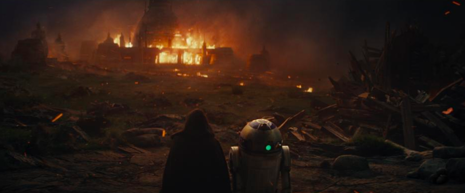 <p>In a flashback, we see some of Kylo Ren’s backstory that was revealed by Han Solo (Harrison Ford) in the previous film<em>. </em>Here, Luke Skywalker and R2-D2 observe the destruction wrought by Kylo Ren’s betrayal of the Jedi. <br>(Credit: Lucasfilm) </p>