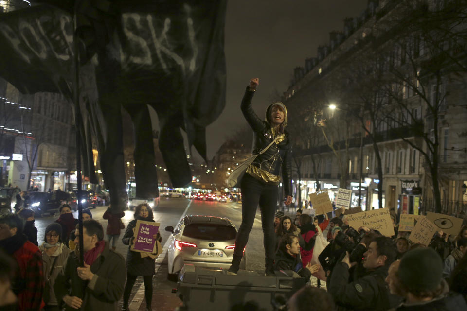 Women protest near the venue of the Cesar awards ceremony, the French equivalent of the Oscar, Friday,Feb. 28, 2020 in Paris. Women's rights activists protested outside the Paris concert hall where France's film academy is presenting its version of the Oscars and director Roman Polanski's latest film is up for the most awards. (AP Photo/Rafael Yaghobzadeh)