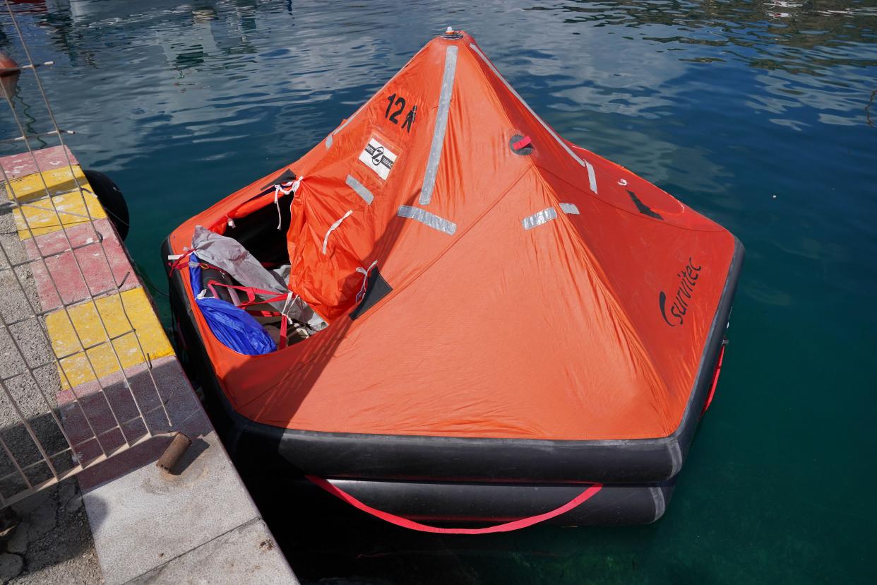 A rapid inflatable emergency lifeboat in Porticello Harbour on the Sicilian coast where the search continues for British technology tycoon Mike Lynch and his daughter Hannah, who are among six tourists missing after a luxury yacht sank in a tornado off the coast of Sicily. The pair are among six tourists missing after the yacht, named Bayesian, was battered during intense storms off the coast of Palermo in the early hours of Monday. Picture date: Tuesday August 20, 2024.