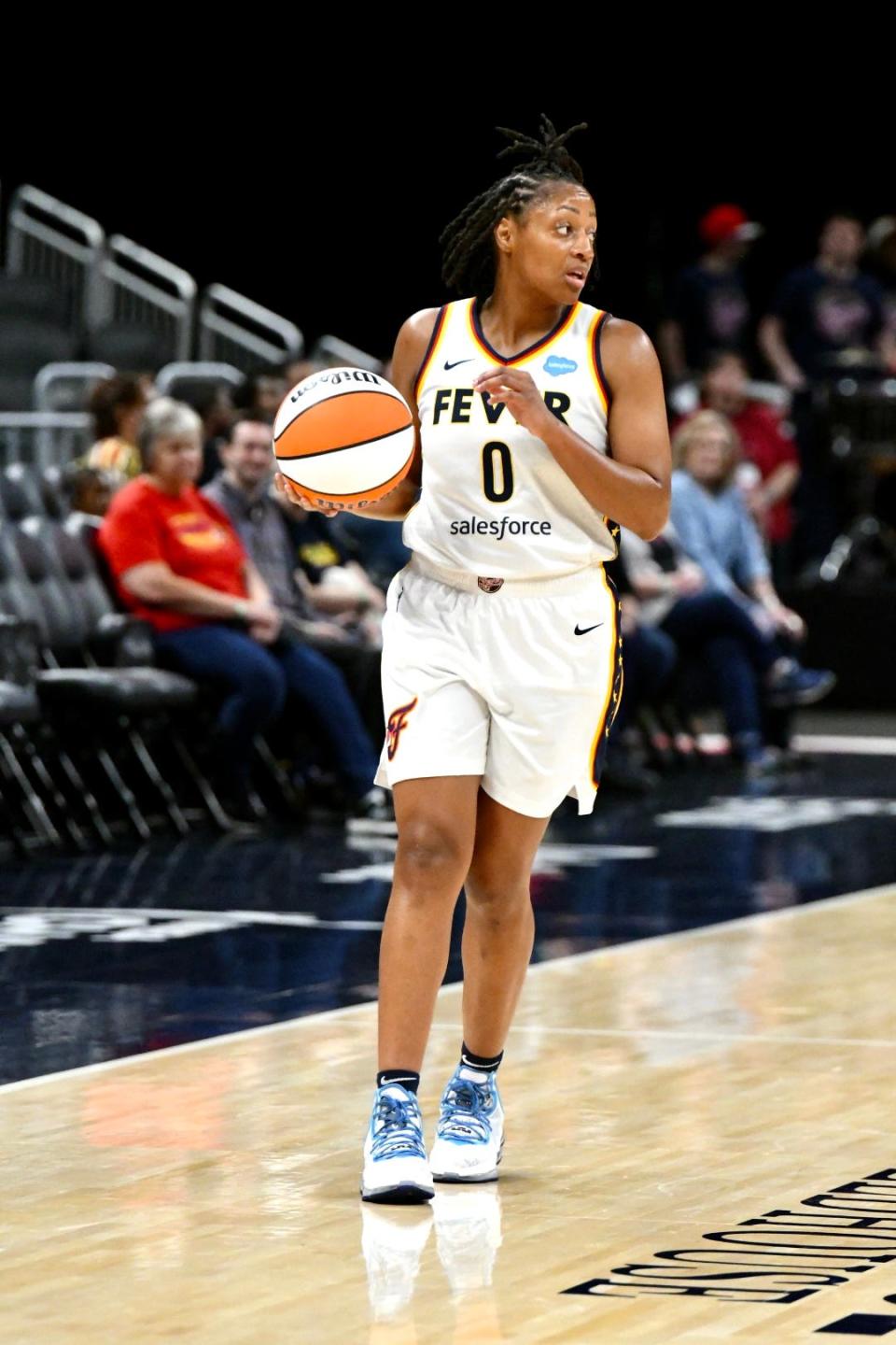 Indiana's Kelsey Mitchell dribbles up the court as the Indiana Fever host the Chicago Sky in a preseason game at Gainbridge Fieldhouse in Indianapolis on April 30, 2022.